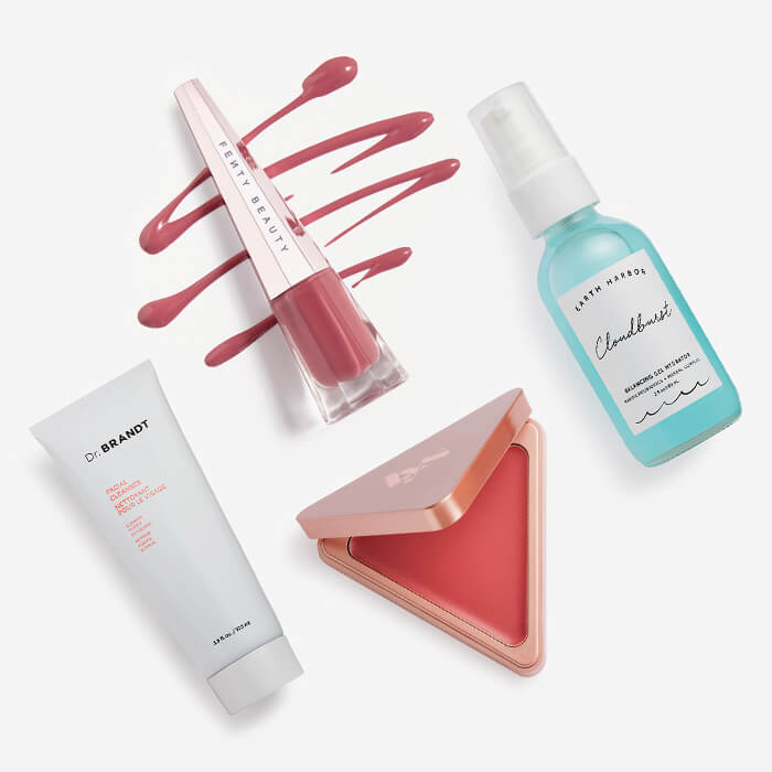 Makeup and skincare products and tools from the October 2022 IPSY Glam Bag Plus on white background