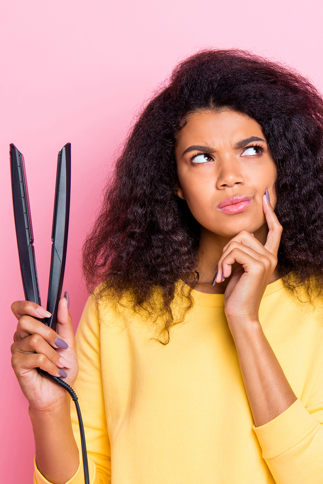 Keeping curly outlet hair straight