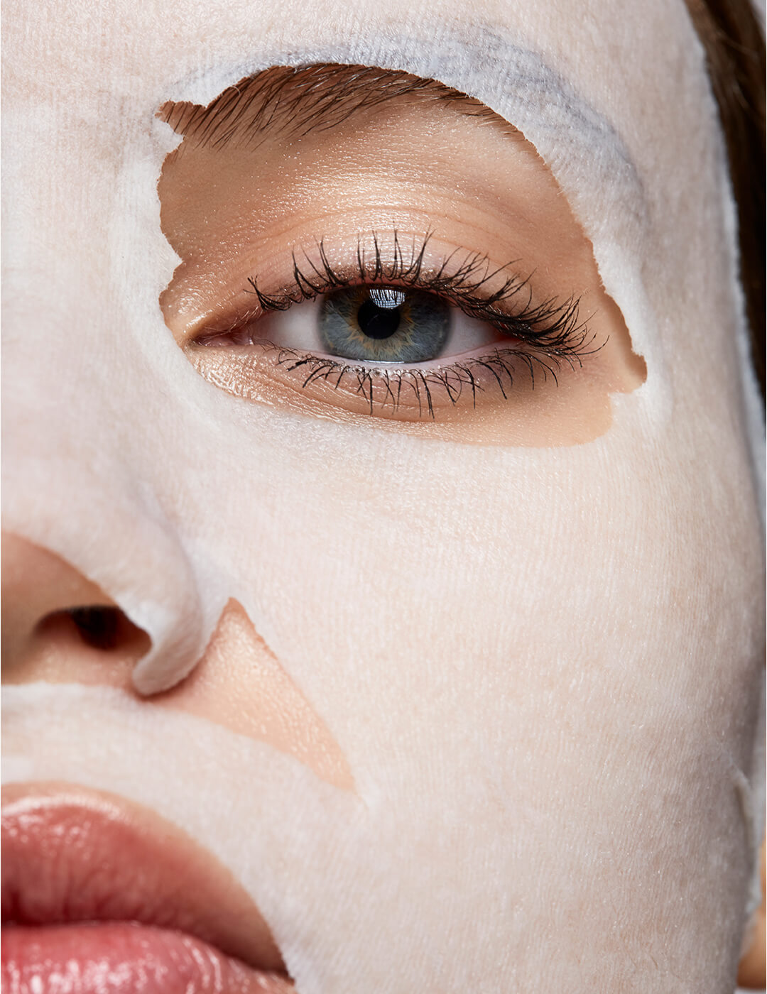 Woman wearing a moisturizing sheet mask
