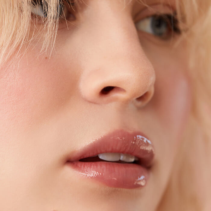 Close-up of a model with a dewy natural makeup look