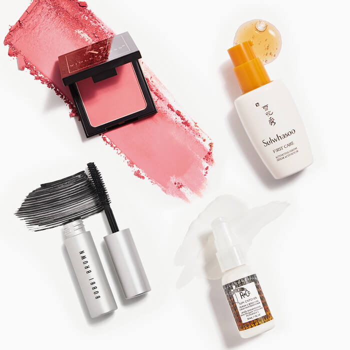 Makeup and skincare products from the February 2022 IPSY Glam Bag swatched on white background