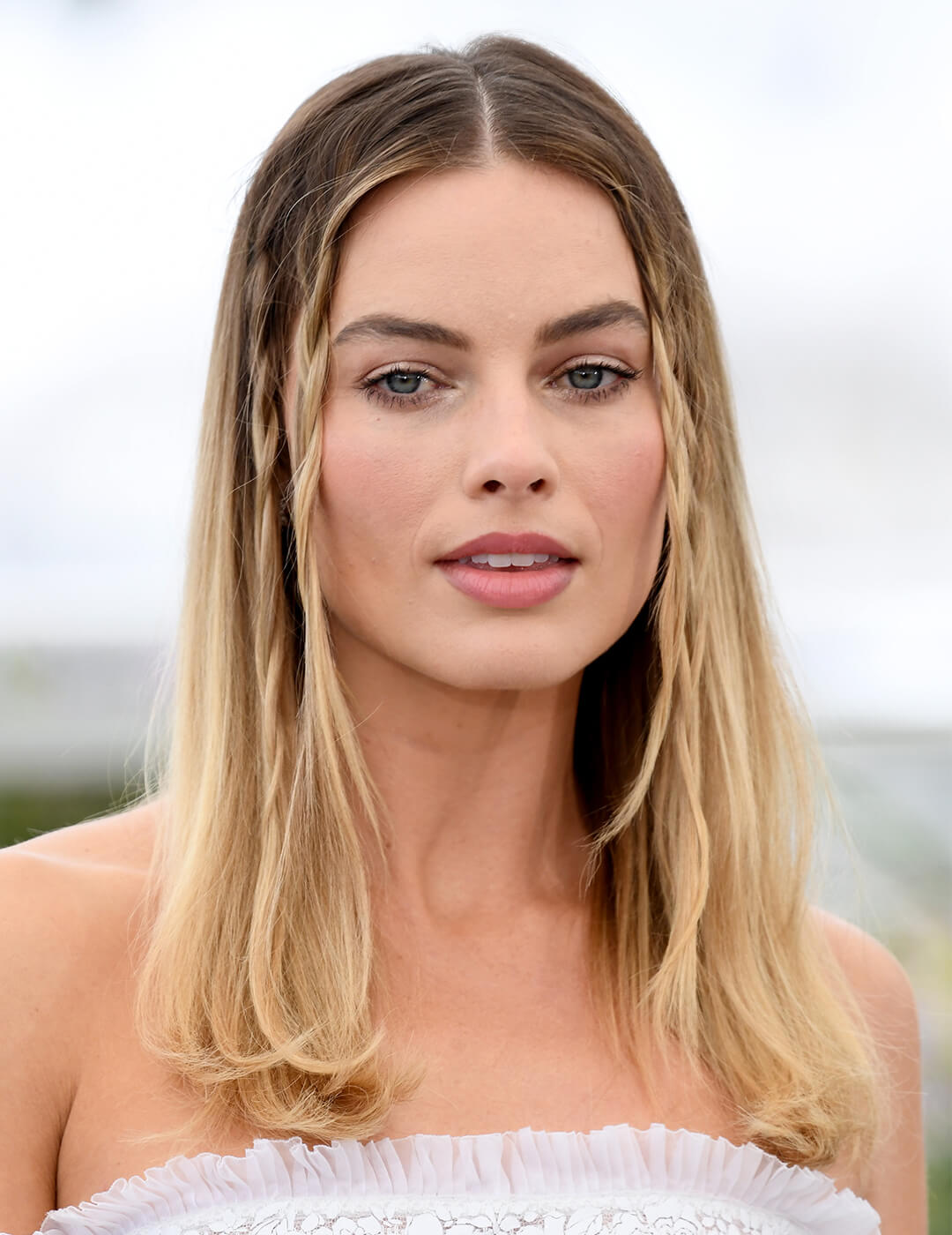 Margot Robbie rocking a boho-inpsired hairstyle at the beach